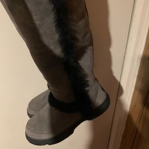 Grey and black Ugg boots